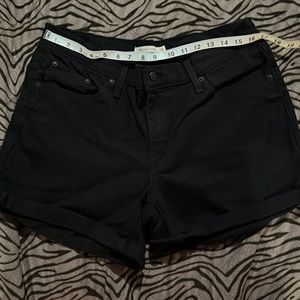 Levi’s mid length shorts size 32.